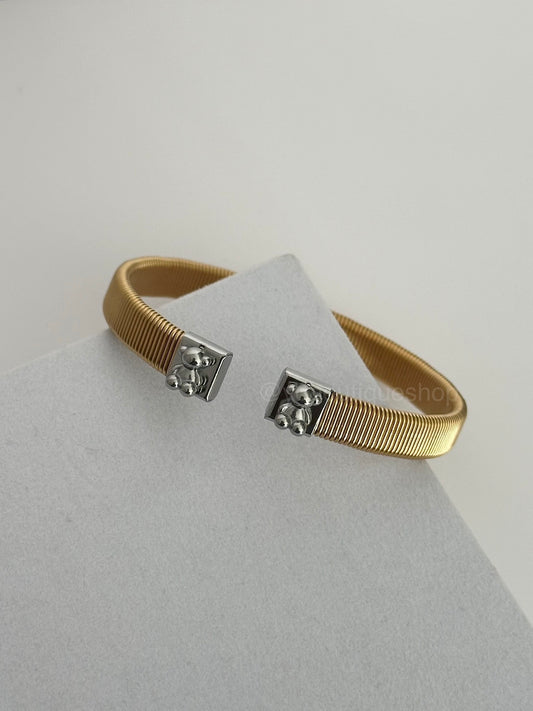 Golden beared bangle