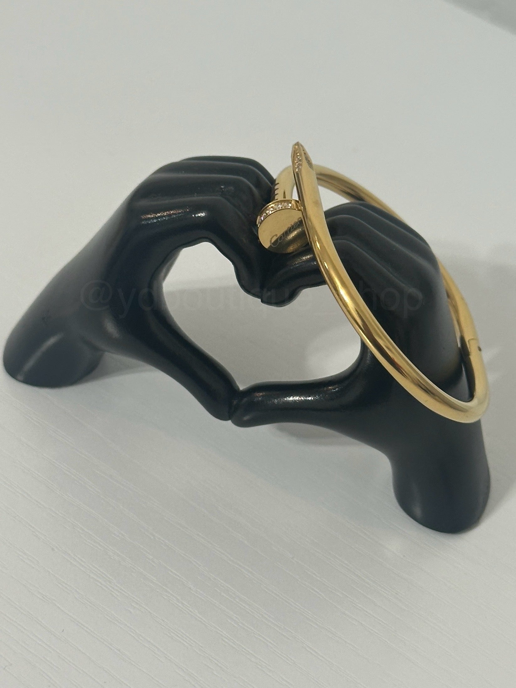 Gold diamond nail with logo